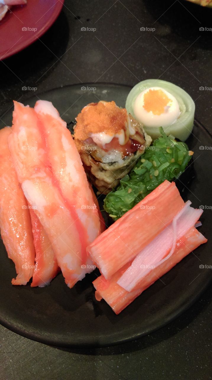 A dish of"Kanikama" crab stick and sushi, Japanese food.