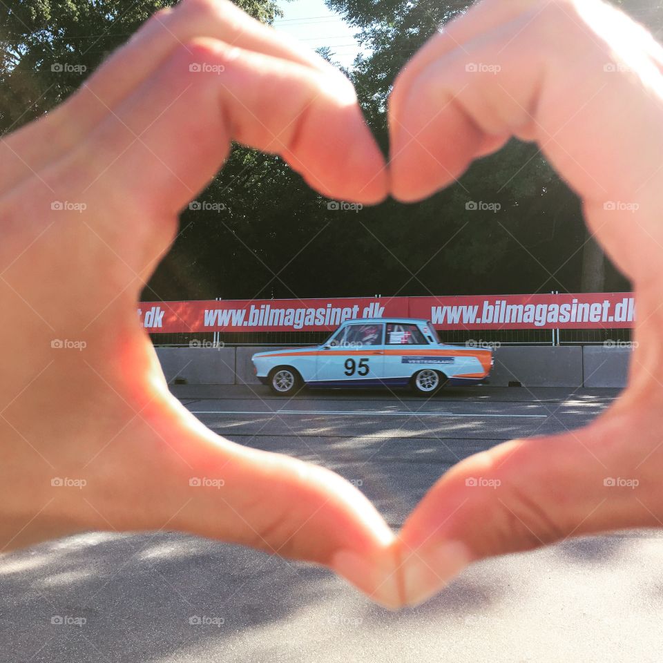 CHGP foto. It's a tradition to take a heart foto with a friend inside. It's taken at Copenhagen Historic Grand Prix 
