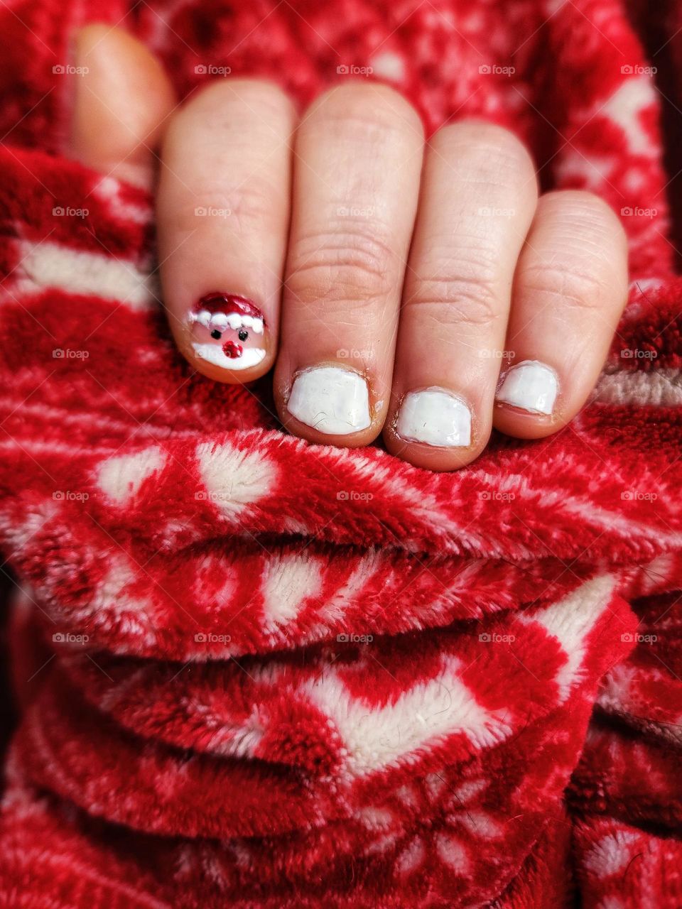 Christmas manicure with a feature Santa nail.