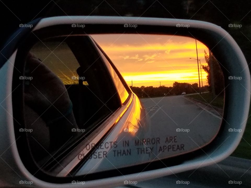 Rearview mirror sunset