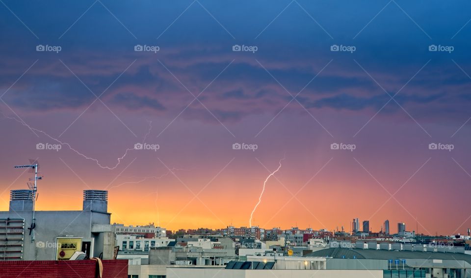 Storm at sunset in Madrid city