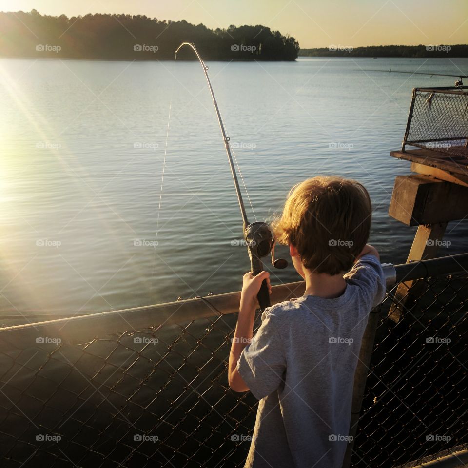 Catching his first Crappie.