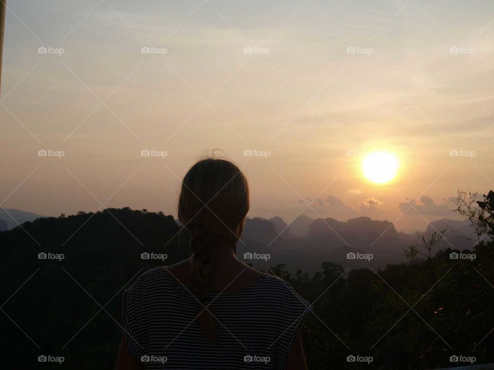 female silhouette during sunset