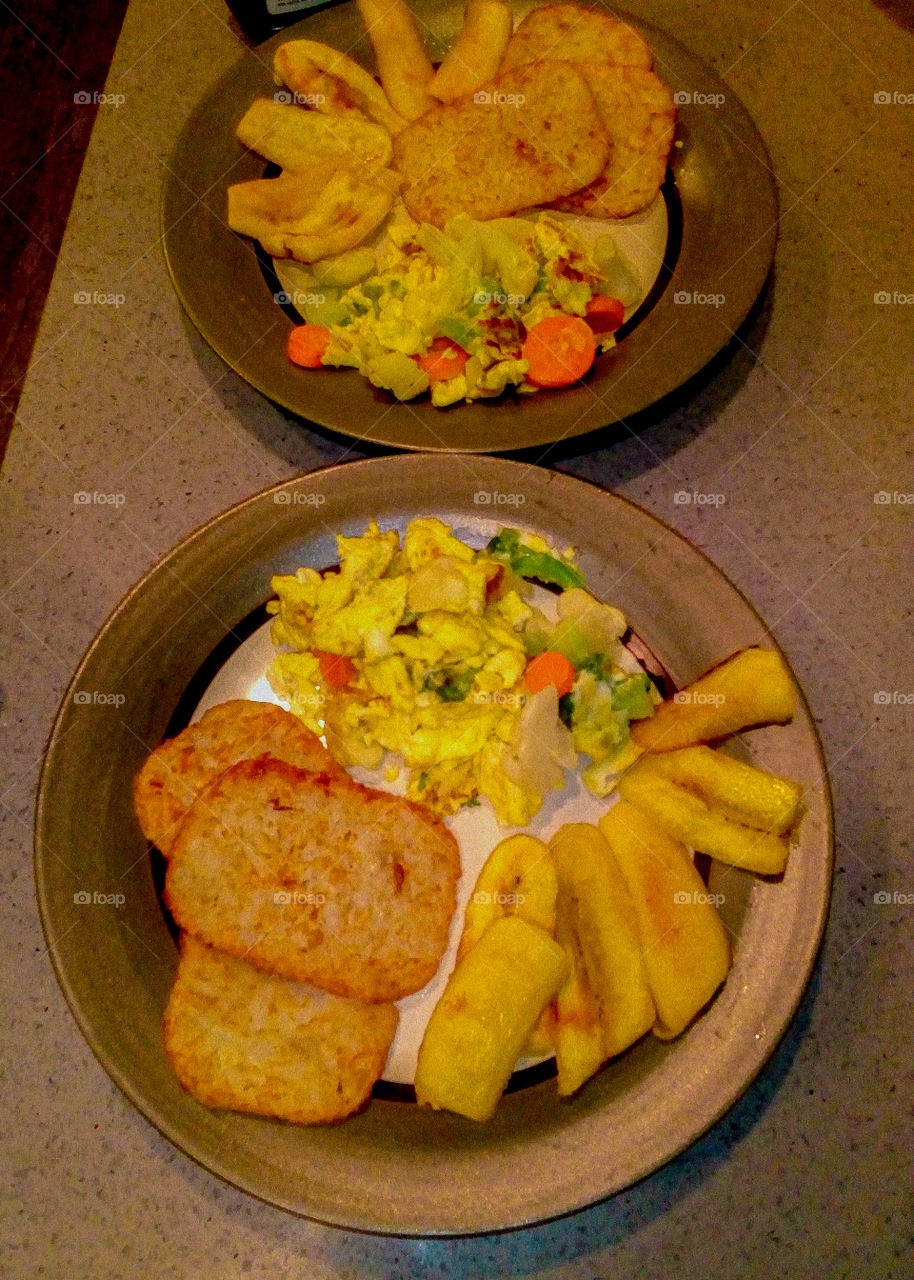 Breakfast - eggs, plantains and hashbrowns