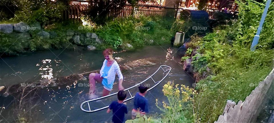 Water treading after “Dr Kneipp” is an excellent exercise that helps stimulate the circulation. It can be practiced in nature such as here in a small brook near “Garmisch-Partenkirchen” in the Bavarian “Alps”. 2024. Hypnotic Productions