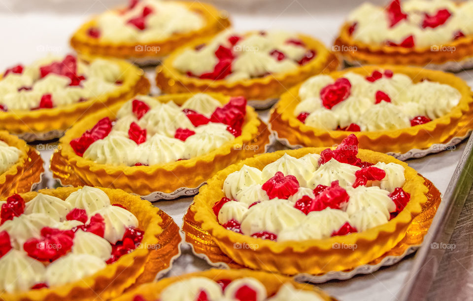 Delicious tarts feeled with vanilla chocolate cream and red berry fruits. Perfect for party time.