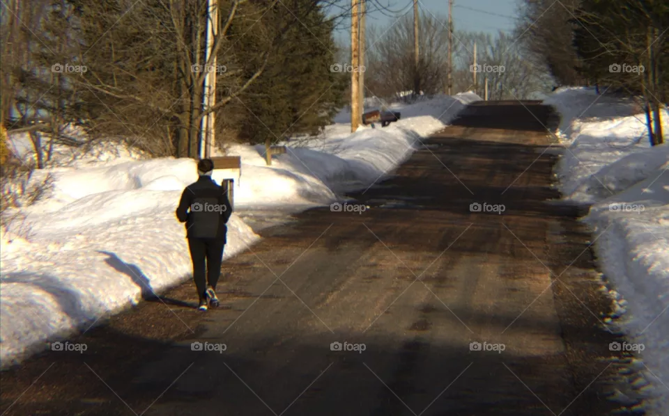 Woman Jogging on a Country Road