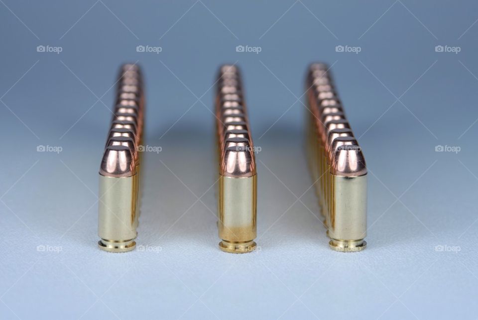 Lined up . Bullets in line! Use them for decoration