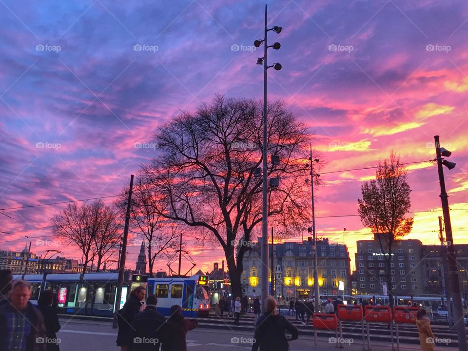 Sunset in front of Amsterdam Central Station