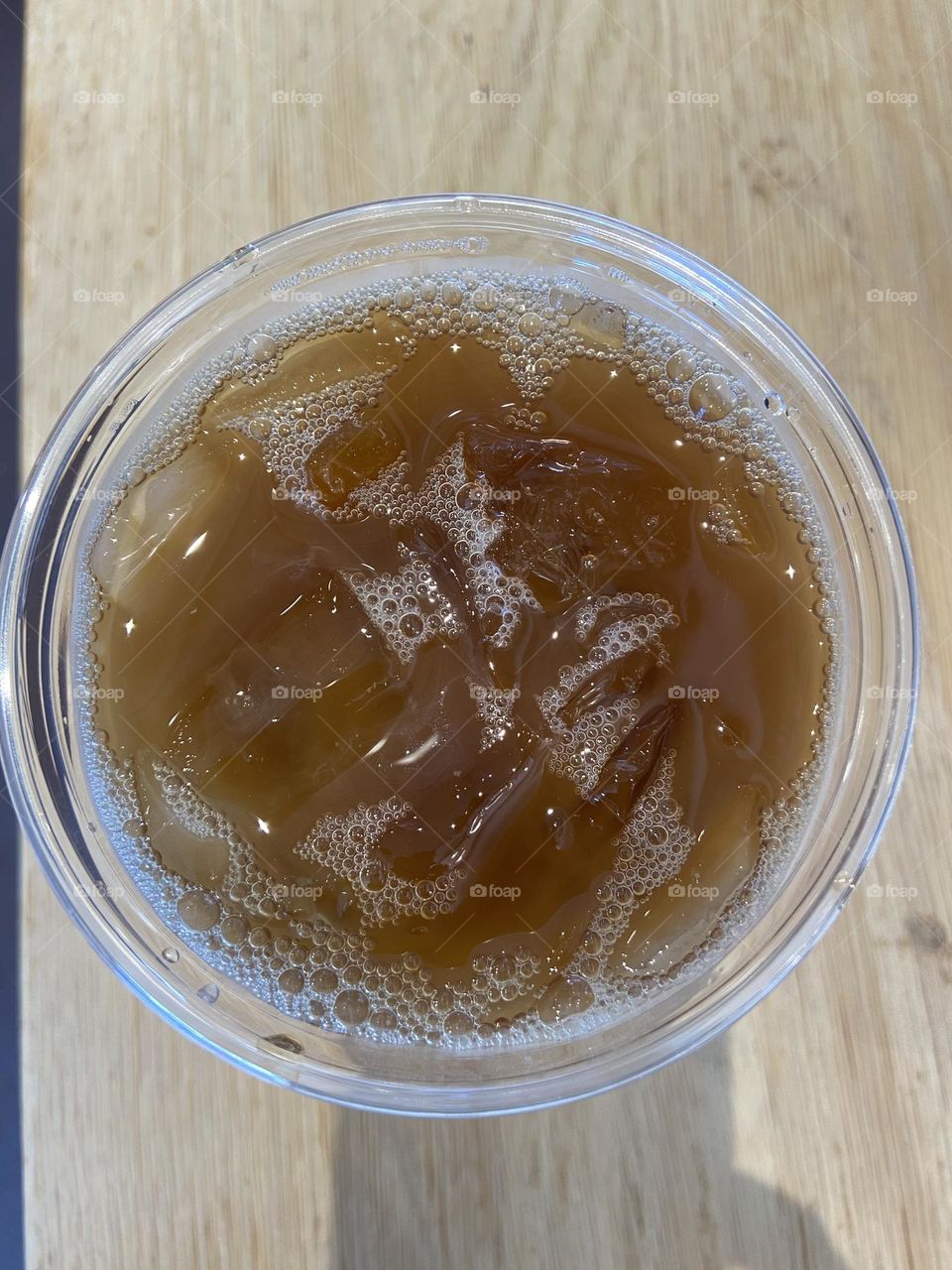 An overhead view of a refreshing iced coffee. So great when you need to quench your thirst and get a little caffeine boost. 