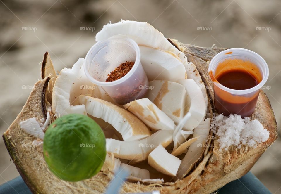 Close-up of coconut snack with chilli