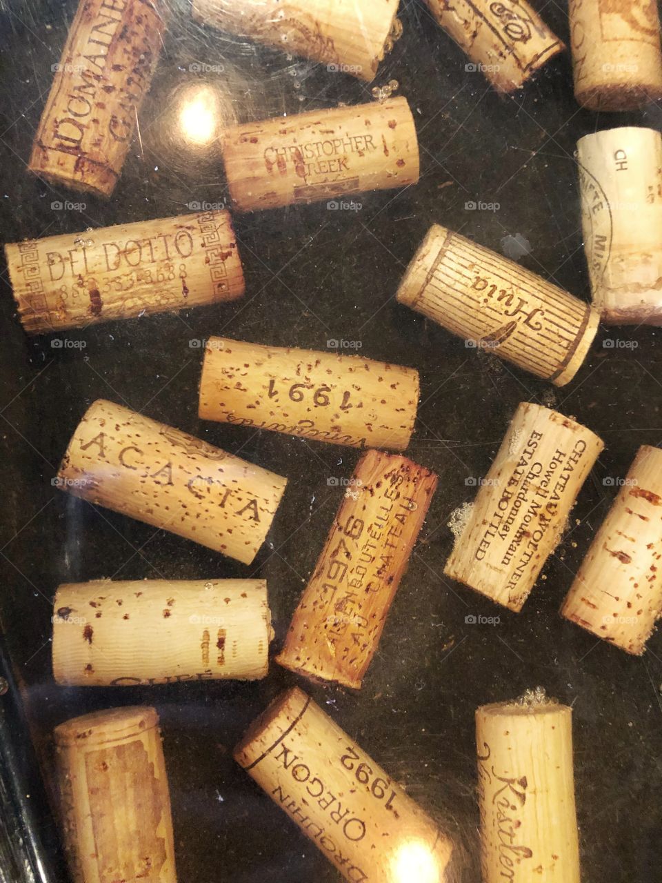 Wine corks under glass