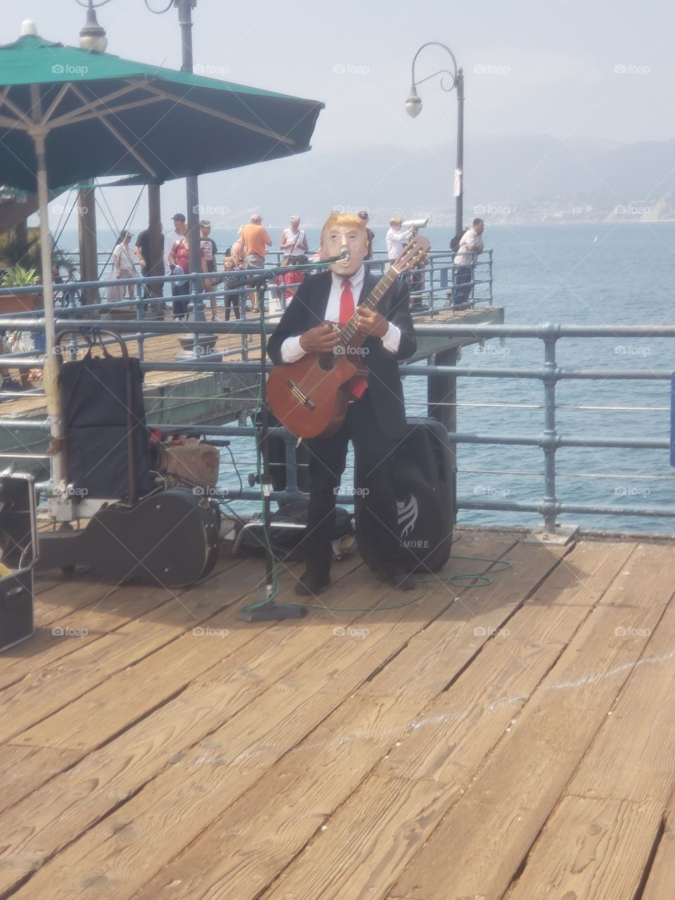 This isn't political. Just some guy having fun at the Santa Monoca Pier in Los Angeles, California.