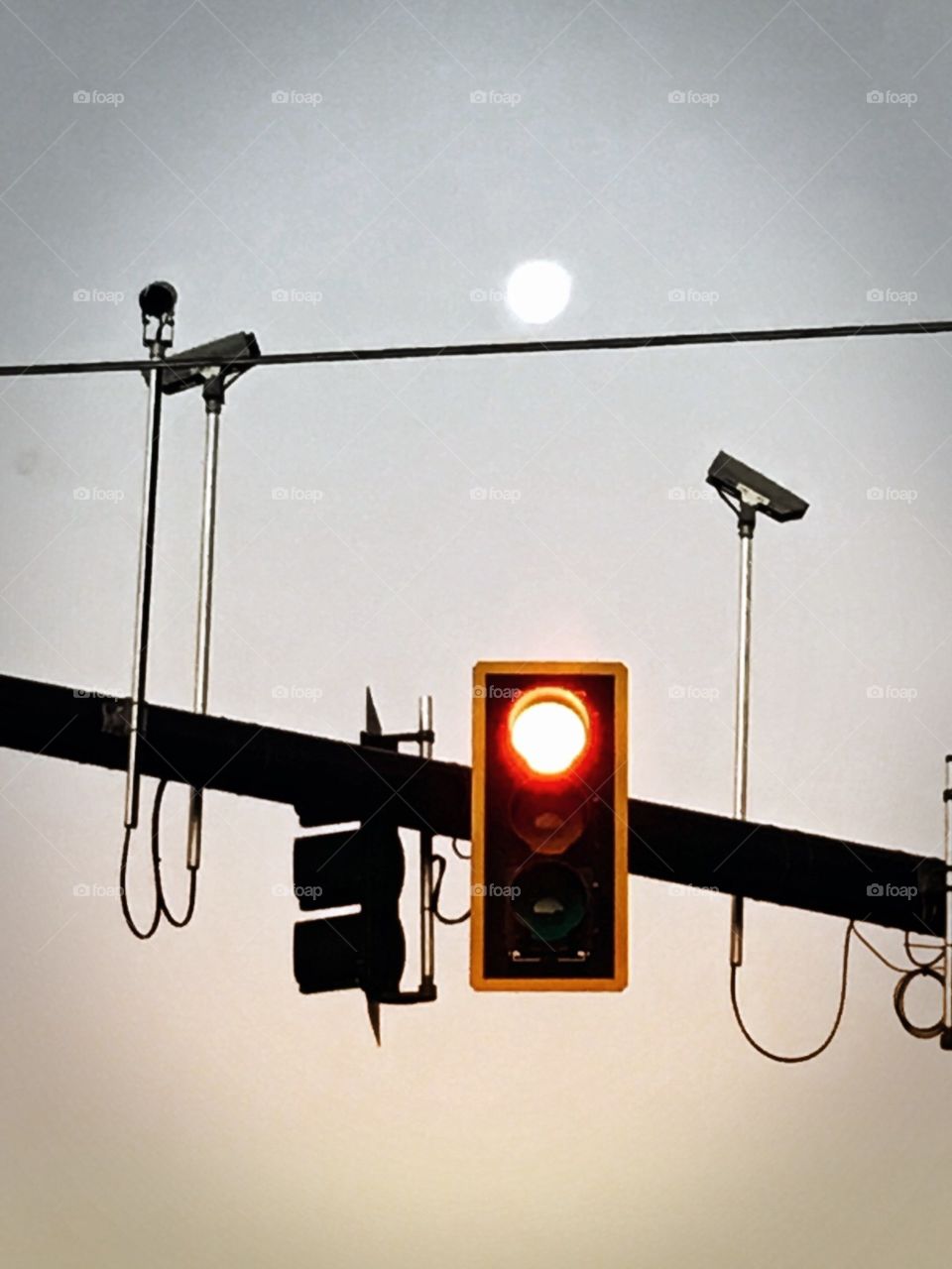 Stop at the ted traffic light under the moon in Florida 