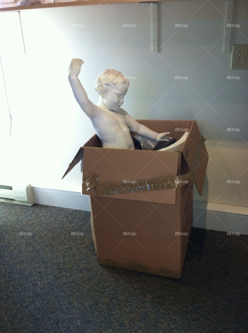Statue in box