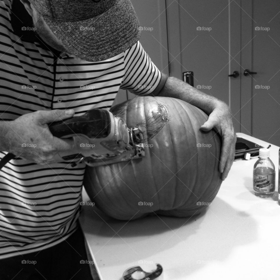 Apparently this is how he chose to do his first pumpkin carving.