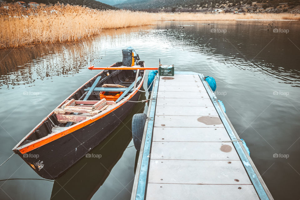 Fishing Boat In The Lake Port
