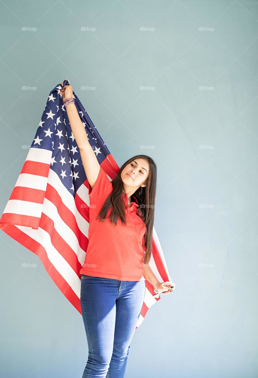 woman holding USA flag