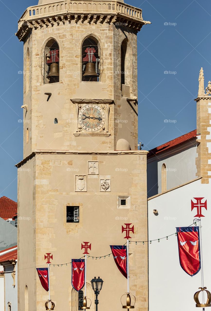 The clock tower of Igreja de São João Baptista in Tomar, Portugal