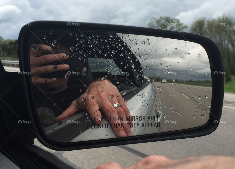 Reflection. Object in mirror is closer than they appear. Pay attention to object in mirror. 