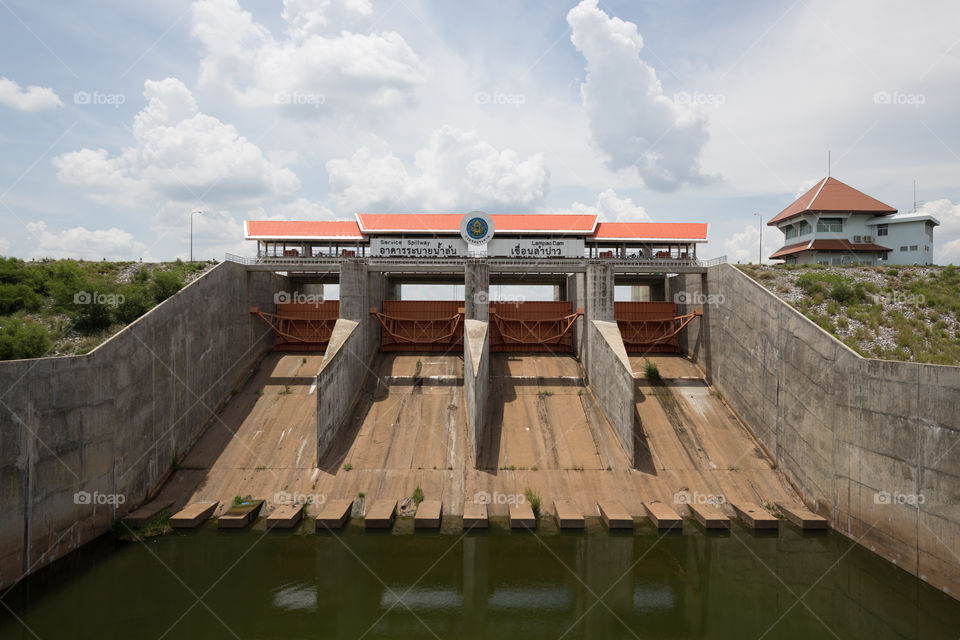 Dam in Thailand with cloudy sky