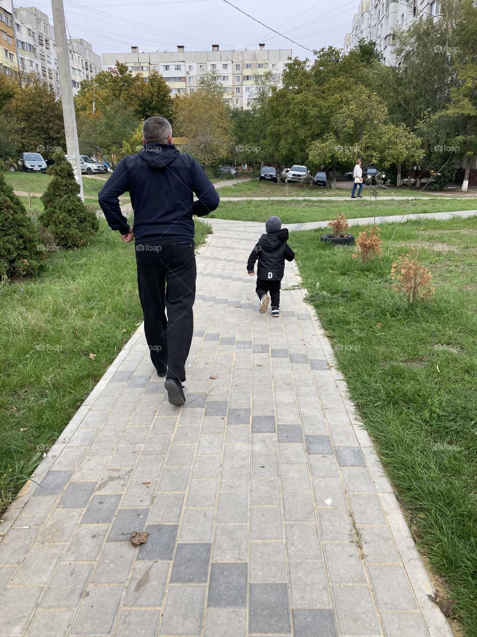 father and son walk