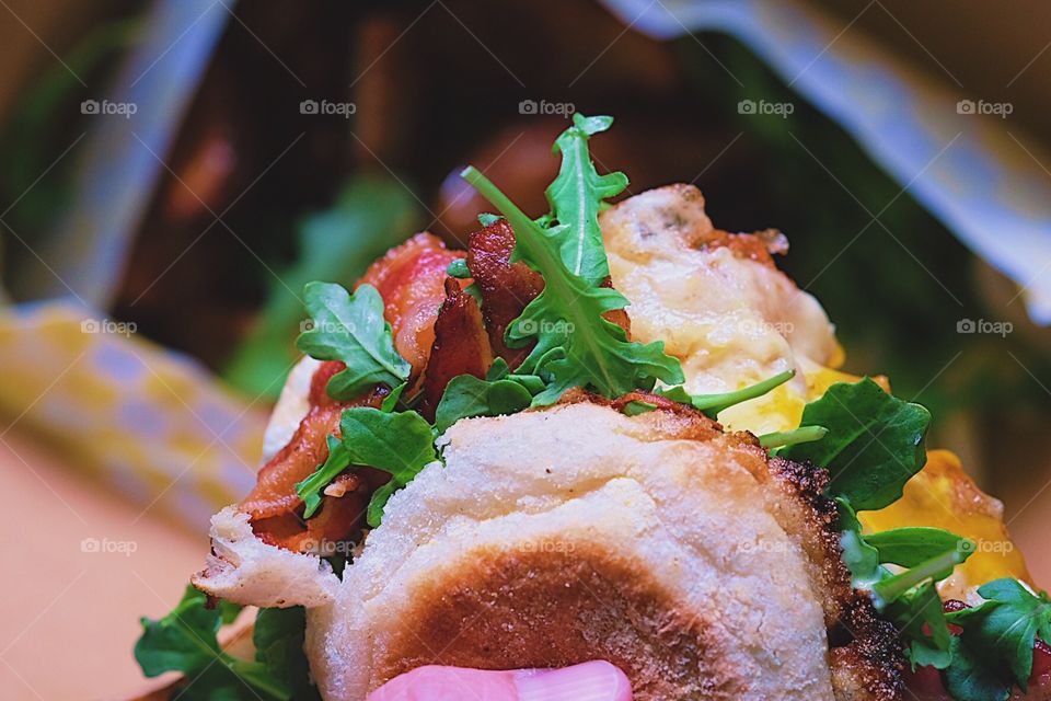 Healthy breakfast sandwich, eating a healthy breakfast, eating healthy during quarantine, delicious food photography, woman holding breakfast sandwich 