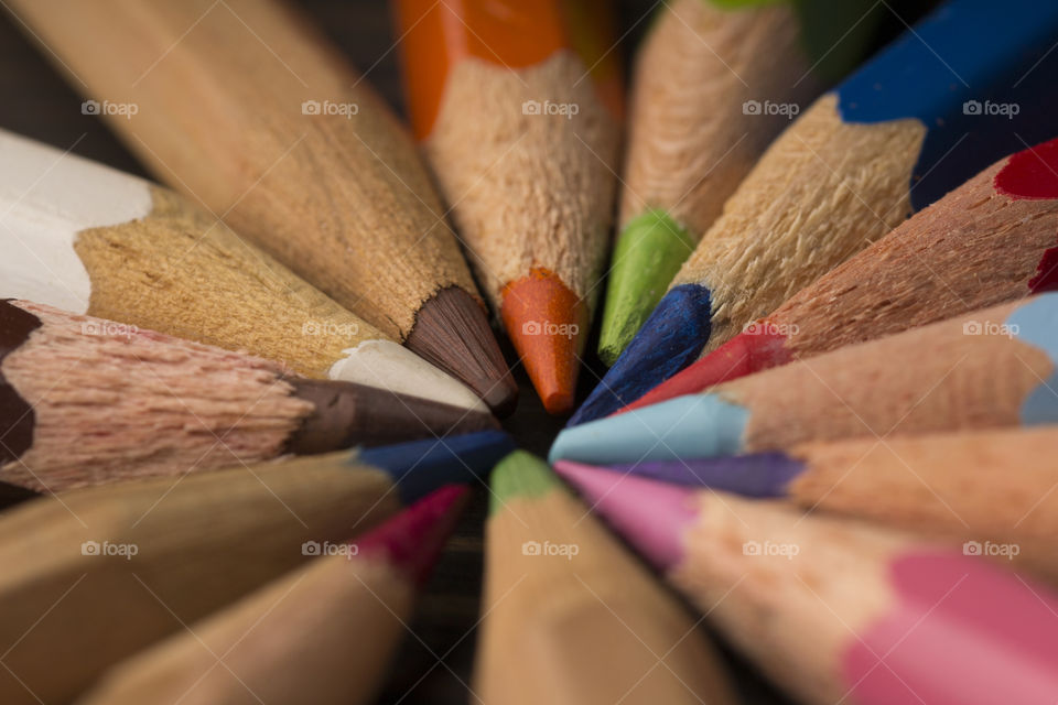 group of colorful pencils,  macro shot.  close up , soft focus.