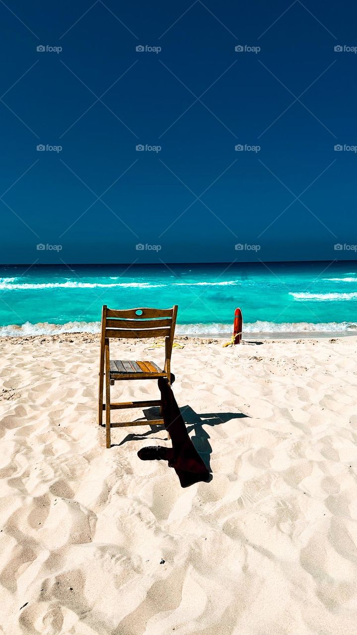 the lonely empty chair at the beach !