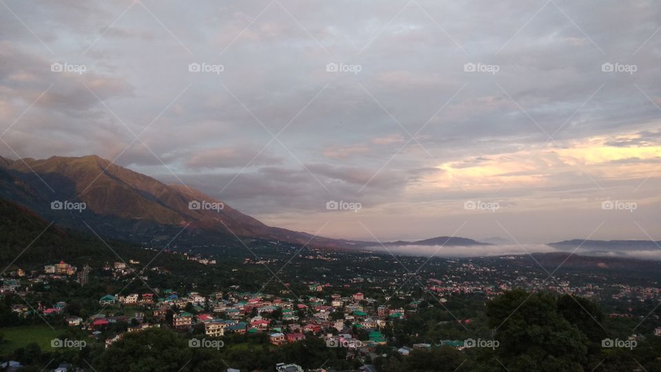 Dhauladhars and dharmshala At sunset