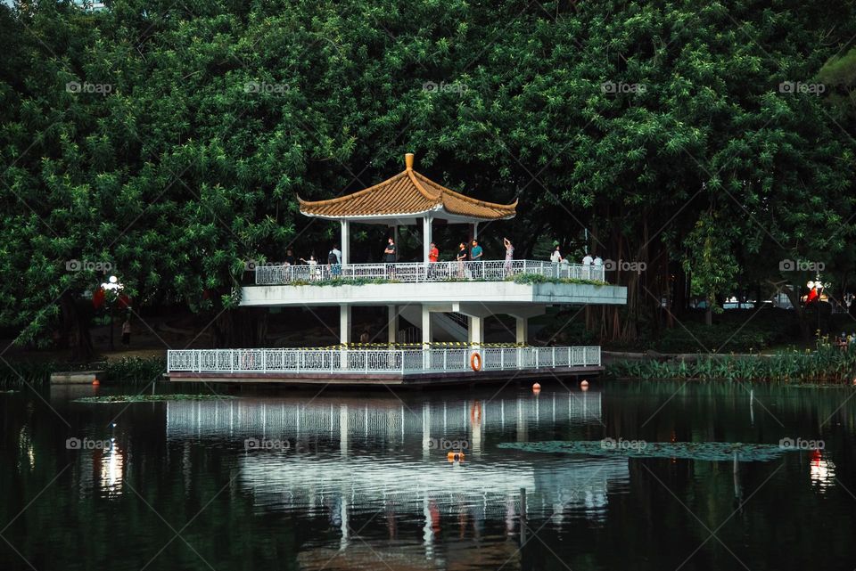 A view of a hut in the lake.