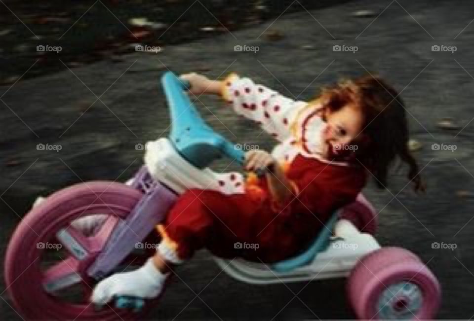 Child Clown Riding 