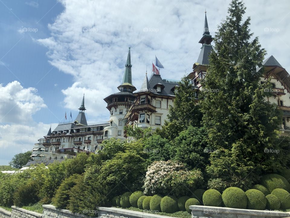 water flows, stream, waterfall, snow in the mountains, laughter, snow in hands, snow in holes, green grass, spring , clouds, sky, castle,