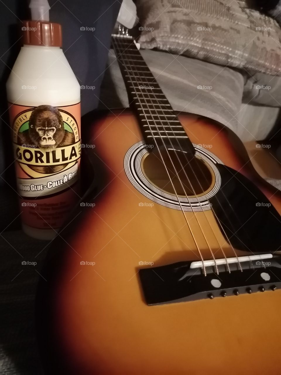 gorilla wood glue I used to fix my guitar it works like a charm this guitar is not very good but gorilla glue holds Robson guitar
