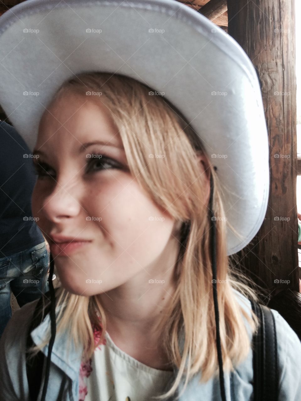 Cowgirl. A girl in a cowboy hat