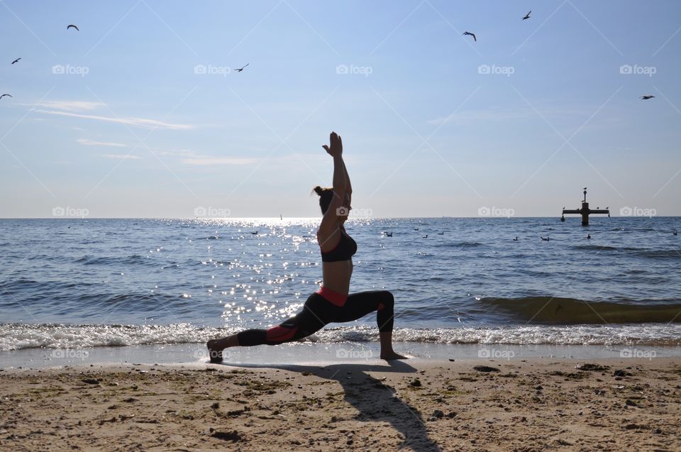 Yoga at the Baltic Sea coast in Poland 