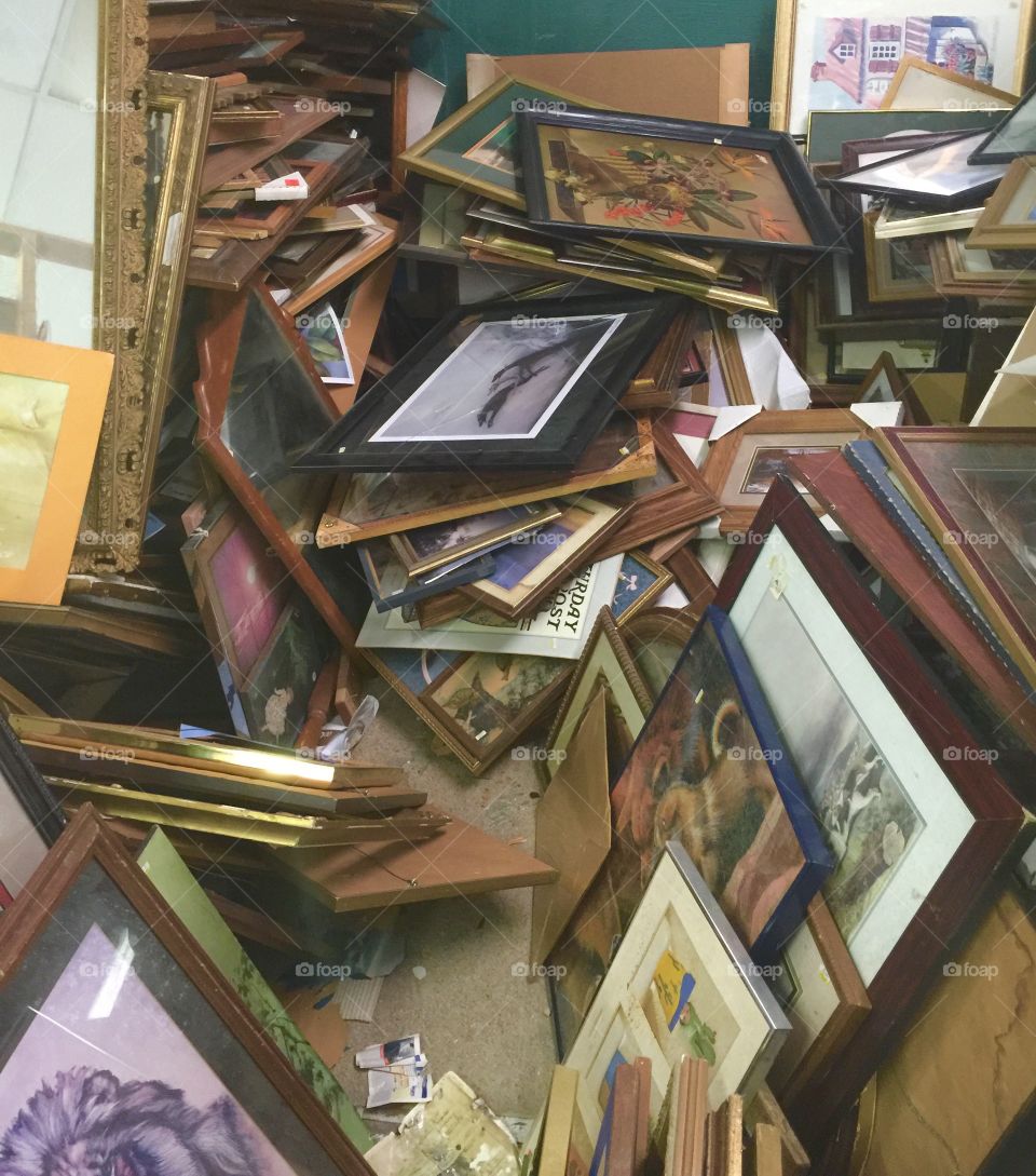 Frame pile inside an old flea market.