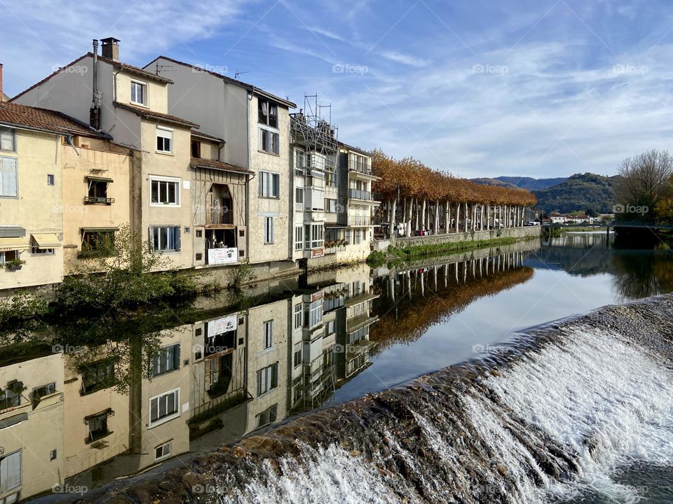 Reflection of the town in the river