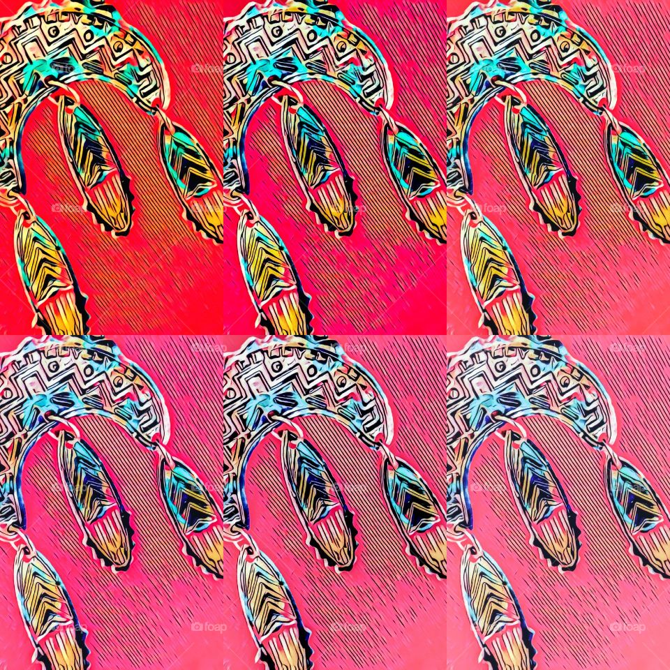 Creative colorful pop art amulet in shades of pink