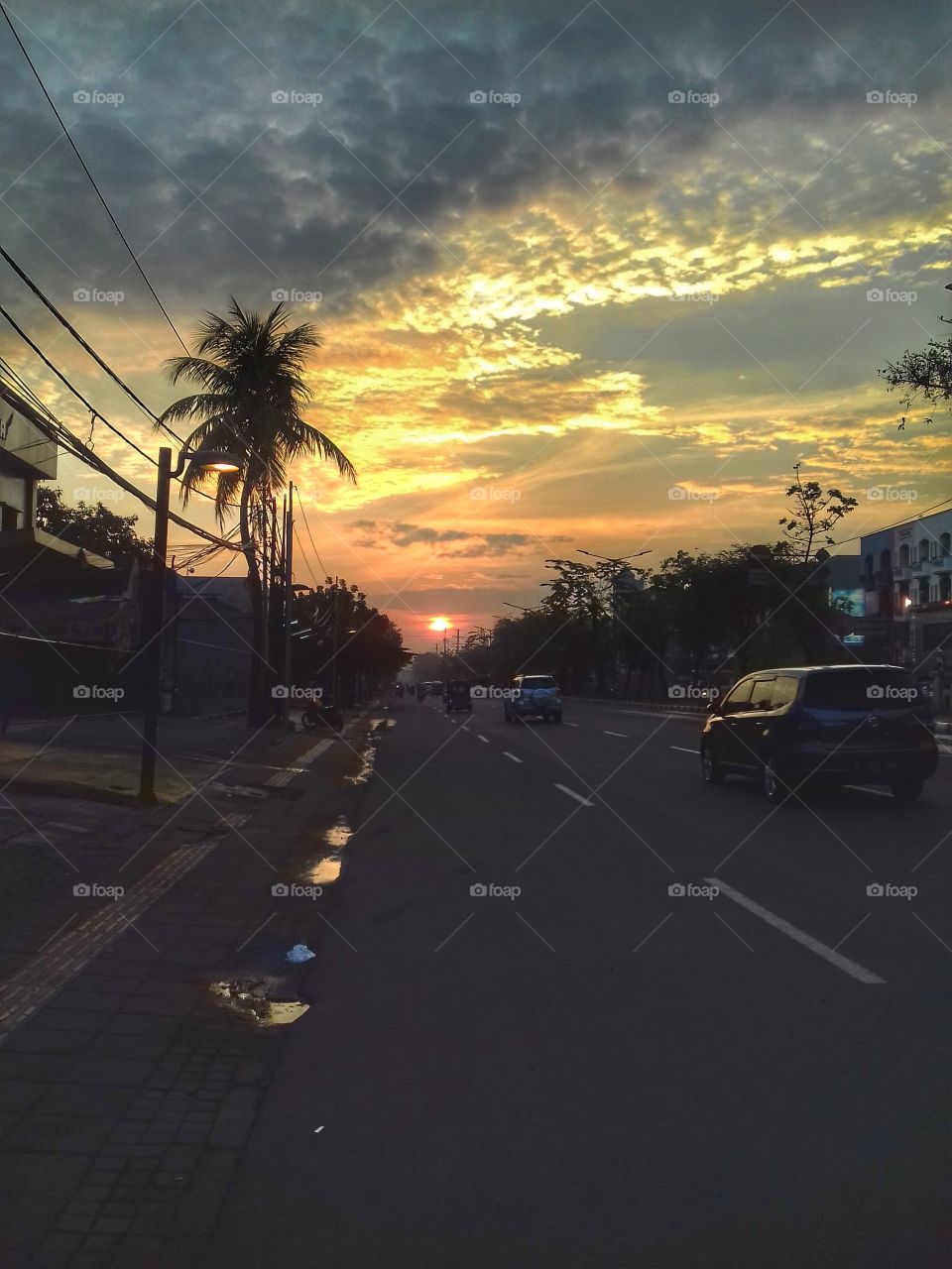 sun at the end of the road