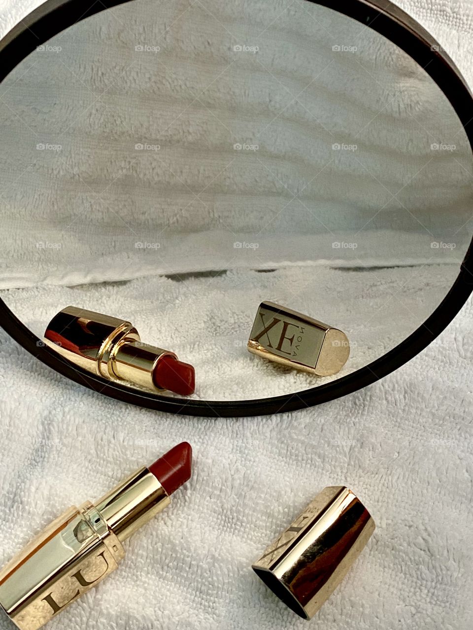 Lipstick in a mirror