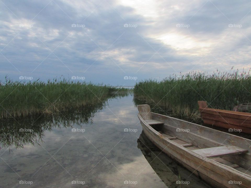 Evening reflection of clouds in the lake