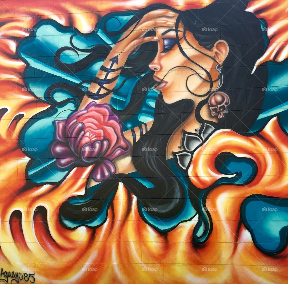 Vibrant street art by Aguayo