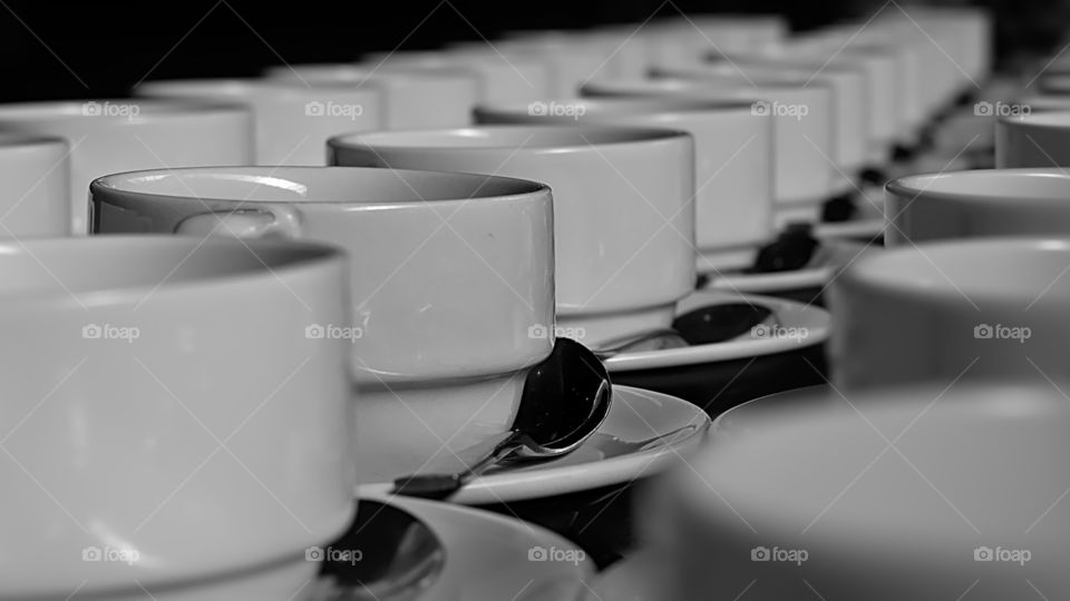 Empty coffee cups lined up