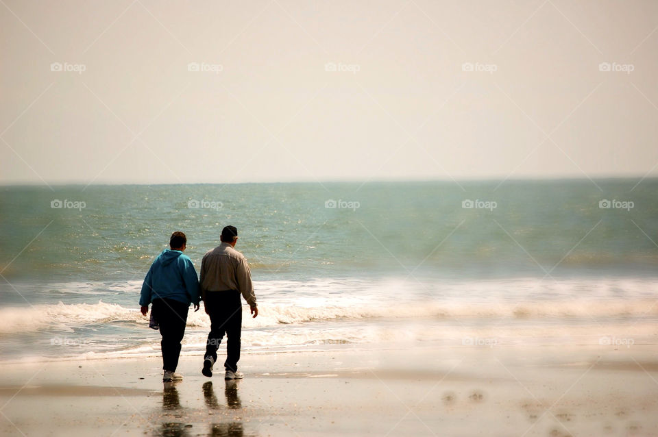 myrtle beach south carolina beach background elderly couple by refocusphoto