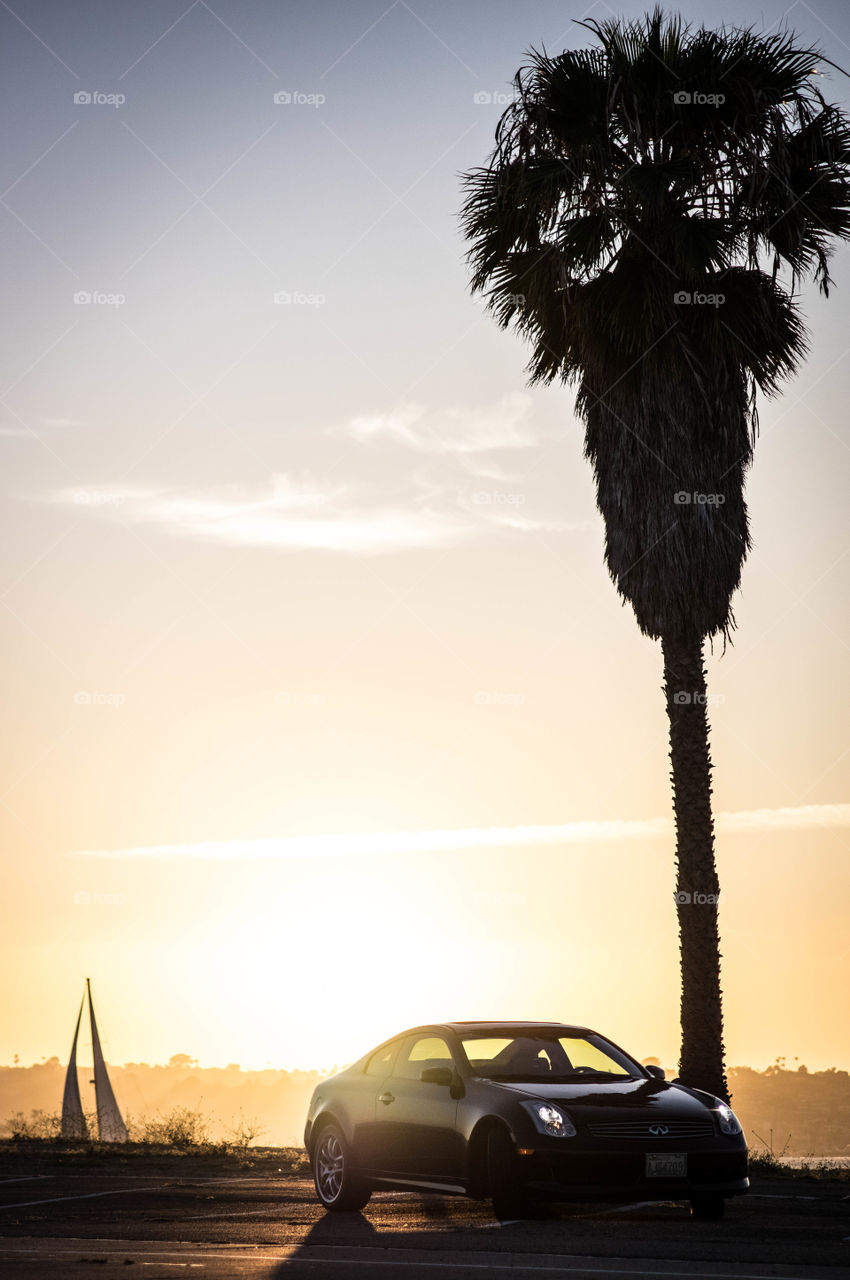 Golden G35. Sunsets behind an Inifiniti G35 in sunny San Diego