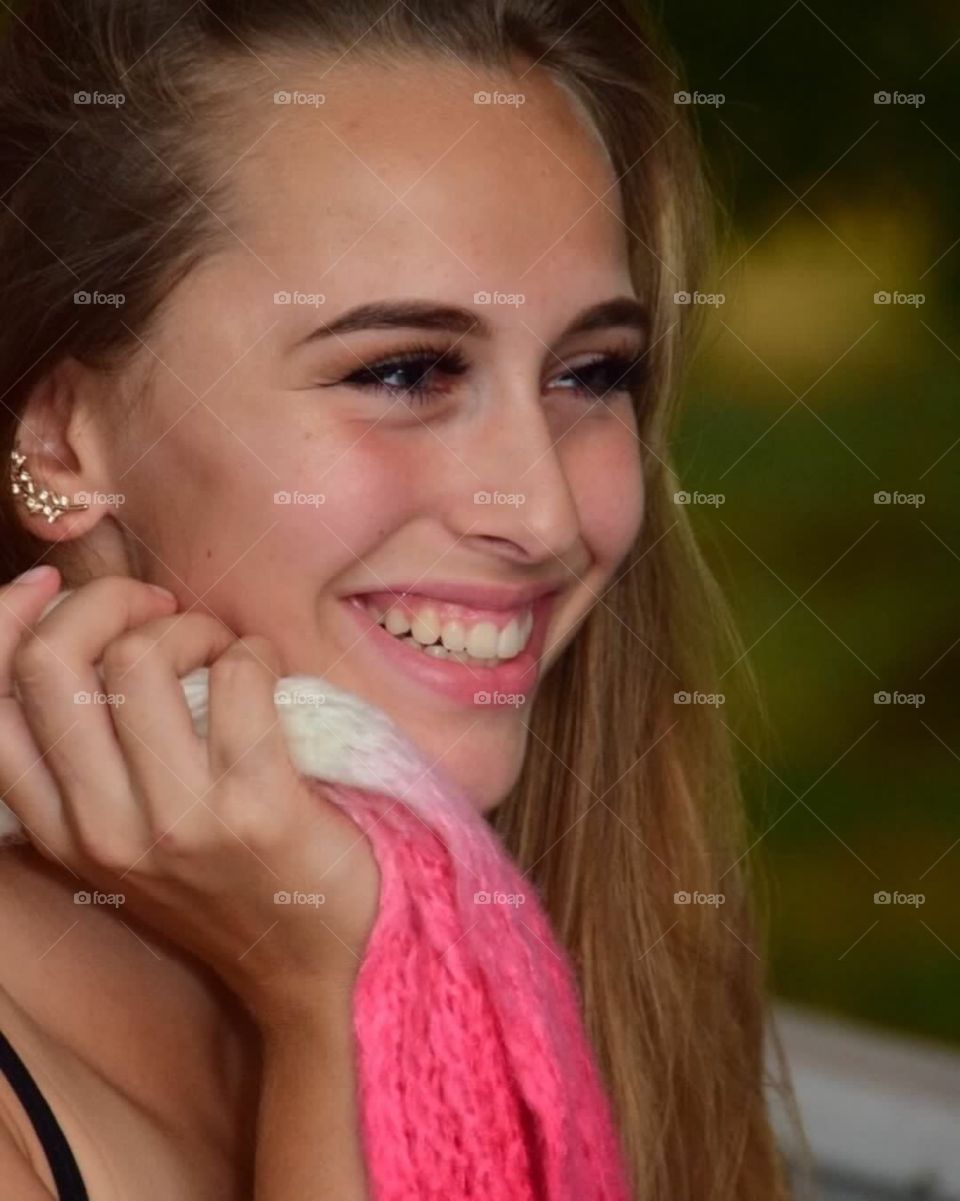 Big smile, beautiful brunette outdoors candid