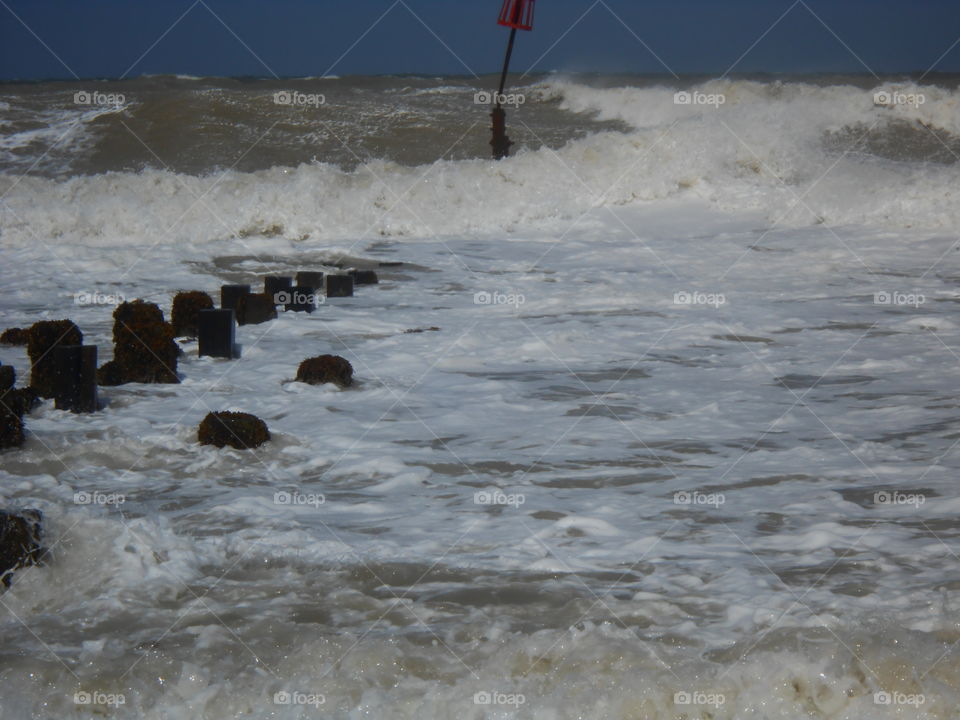 Storm and foam on the Norfolk coast