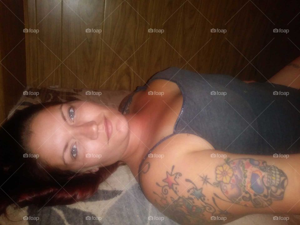 Seductive tattooed Blue eyed selfie