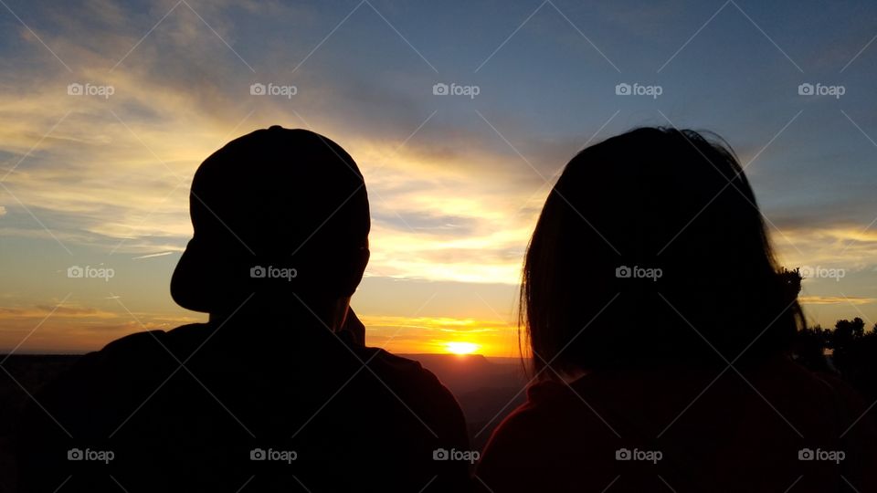 Couple Watching the Sun Set